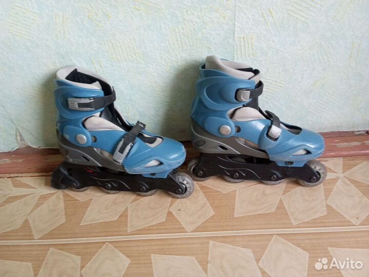 Роликовые коньки