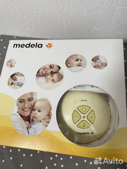 Молокоотсос medela электрический