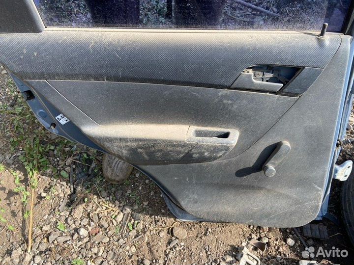 Дверная карта задняя левая Chevrolet Aveo T250