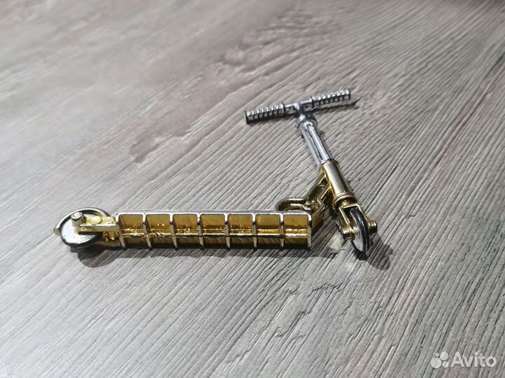 Игрушечный самокат