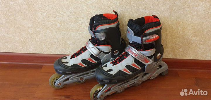 Роликовые коньки