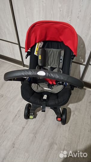 Автокресло с колёсами Doona и isofix