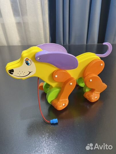Игрушка собачка каталка