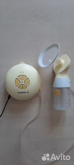 Молокоотсос medela swing flex электрический