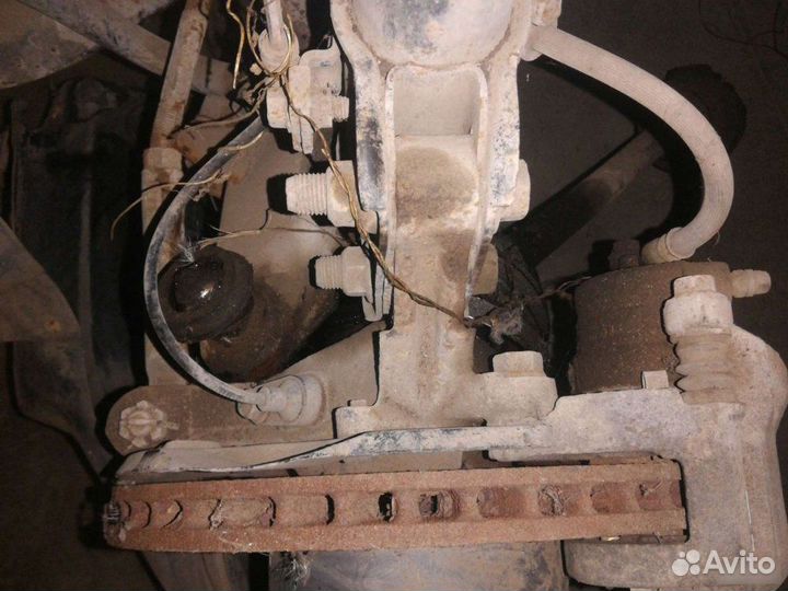 Кулак поворотный левый Subaru Forester