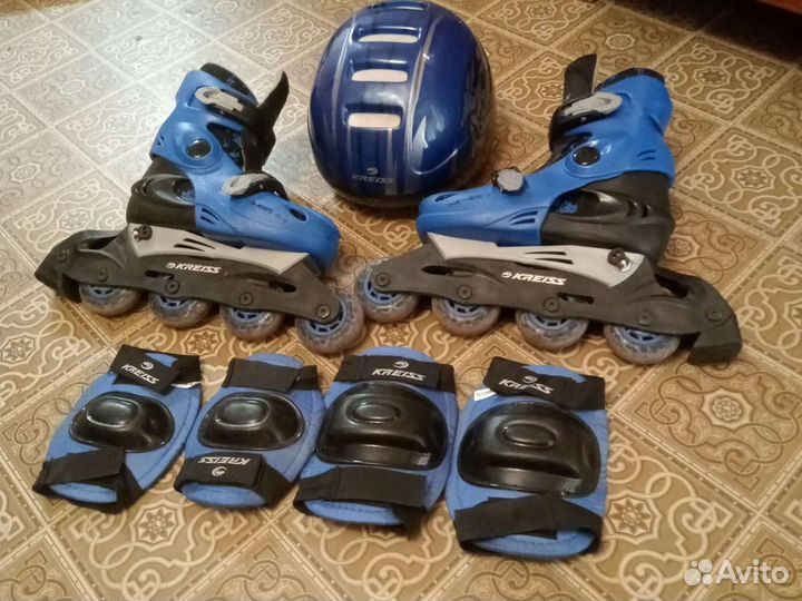 Роликовые коньки