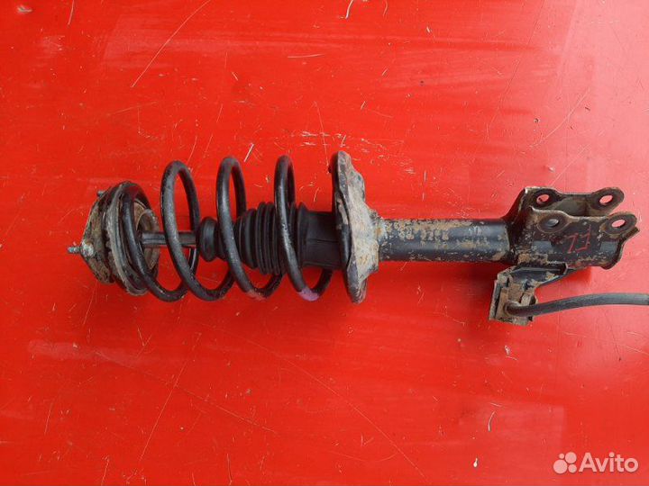 Амортизатор передний левый Nissan Almera N16