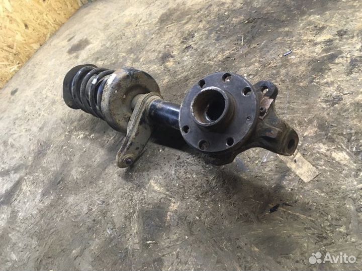 Стойка подвески передняя правая Daewoo Nexia седан