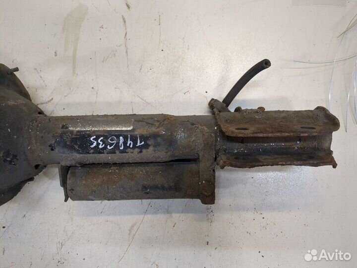 Амортизатор подвески левый задний Subaru Forester (S11)