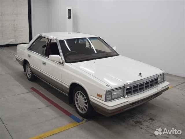 Замок багажника Nissan Laurel HC32 RB20E