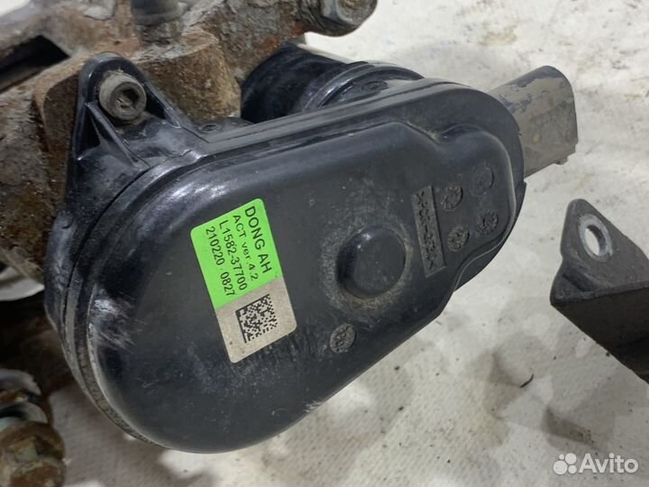 Суппорт тормозной задний левый KIA K5 DL3