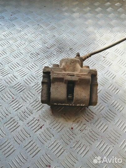 Суппорт тормозной передний левый Renault Logan