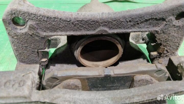 Суппорт тормозной передний левый Mazda Cx-5 KE