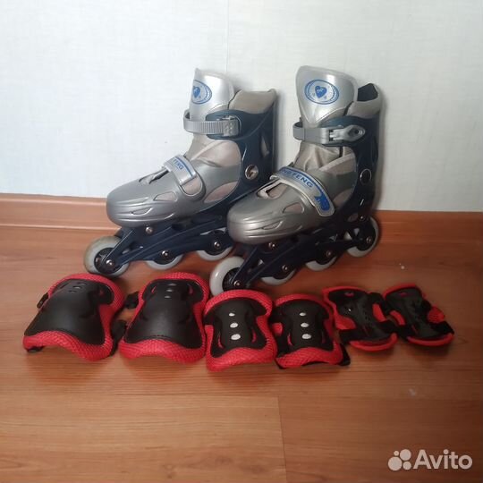 Роликовые коньки
