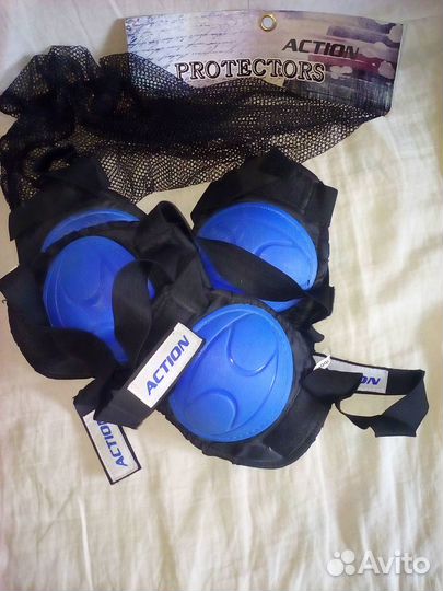 Роликовые коньки и защита