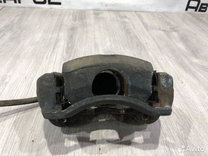 Суппорт тормозной передний правый Kia Rio 3 G4FA