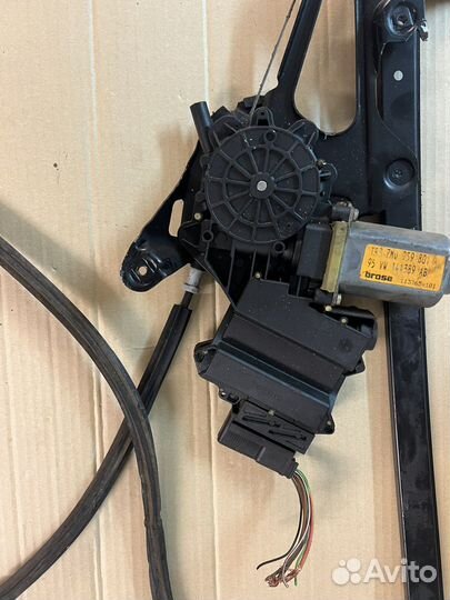 Стеклоподъемник левый Ford Galaxy/ VW Sharan 1