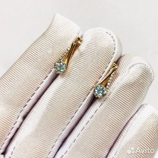 Золотые серьги с камнем