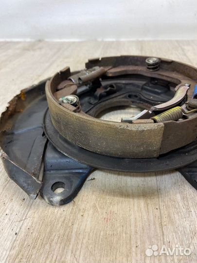 Механизм ручного тормоза задний левый Mitsubishi