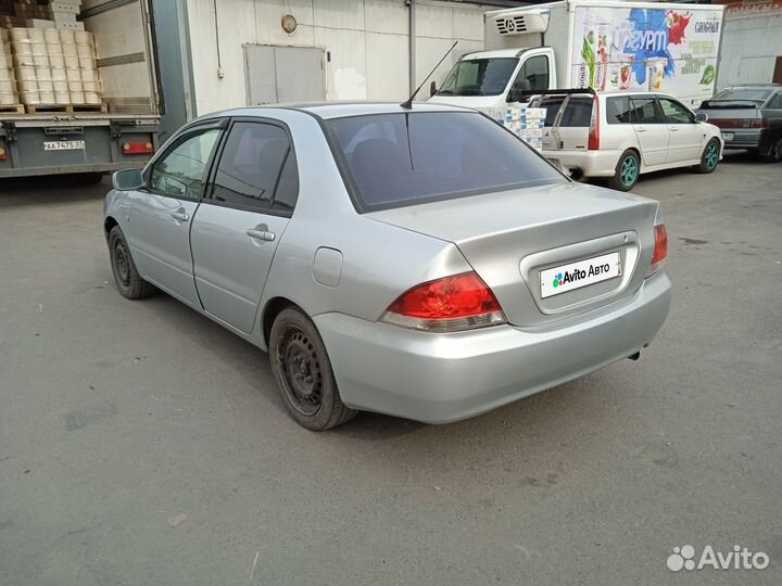 Mitsubishi Lancer 1.6 AT, 2004, 300 000 км