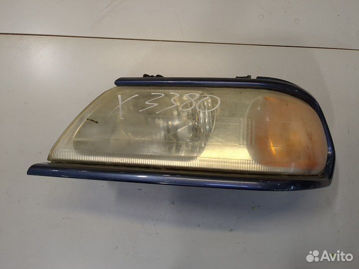 Ресничка под фару Mitsubishi Montero Sport / Pajer