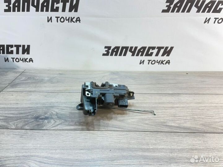 Замок боковой двери передний левый Opel Astra H