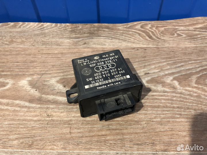 Блок управления корректора фар A3 A4 A6 A8 Q7