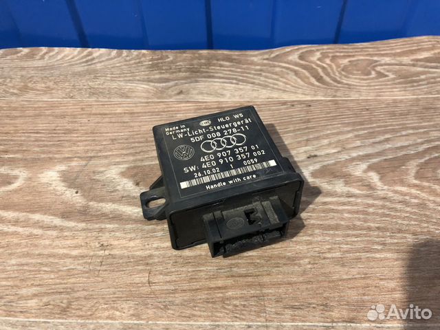 Блок управления корректора фар A3 A4 A6 A8 Q7