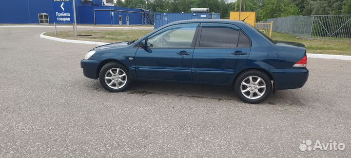 Mitsubishi Lancer 1.6 МТ, 2006, 282 000 км