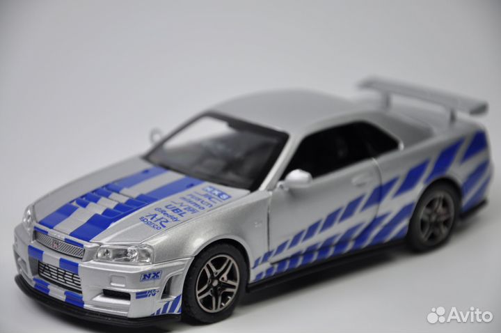 Модель авто Nissan Skyline GT-R R34 1:32 меатлл