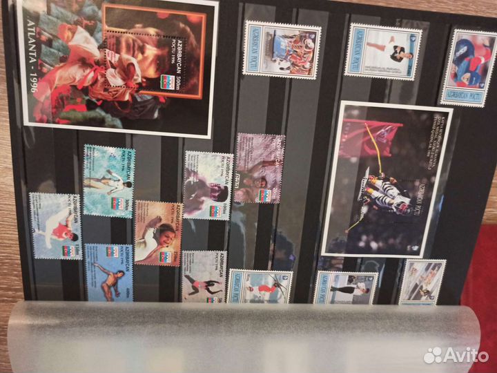 Большой и маленький альбом с марками