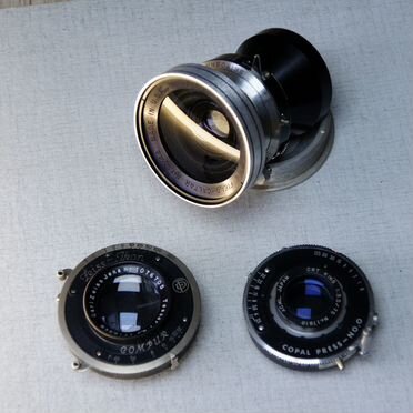 Объективы в затворах