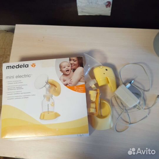 Молокоотсос medela электрический