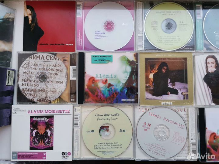 Alanis Morissette коллекция дисков, книг, журналов