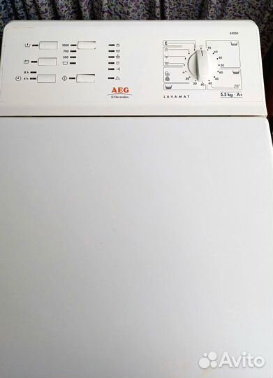 Стиральная машина с вертикальной загрузкой