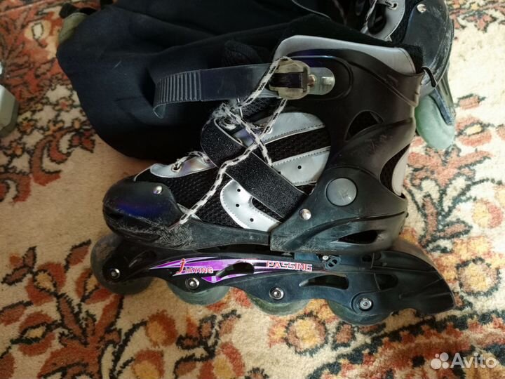 Роликовые коньки