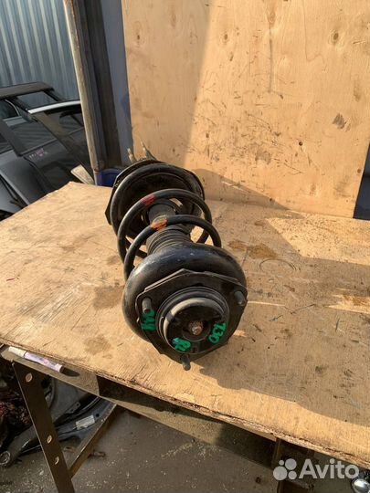 Стойка амортизатор задний левый Nissan X-Trail t30