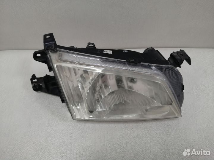 Фара правая Mazda Demio