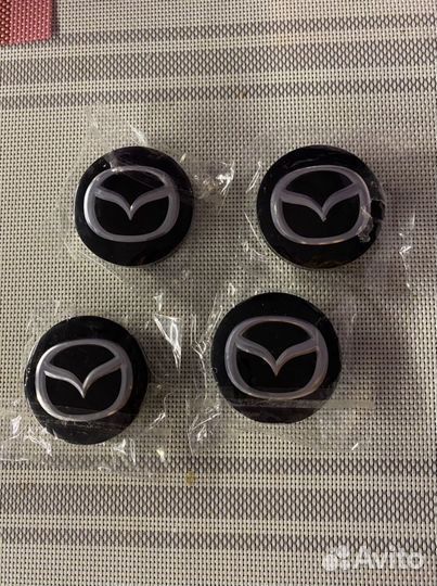 Колпачок ступицы Mazda