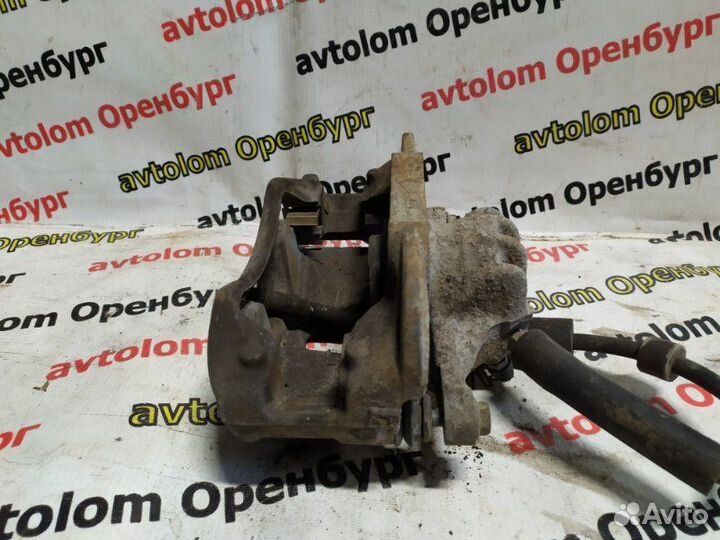 Суппорт тормозной передний левый Peugeot 308