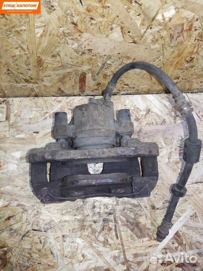 Суппорт тормозной передний правый Mazda 3 BL