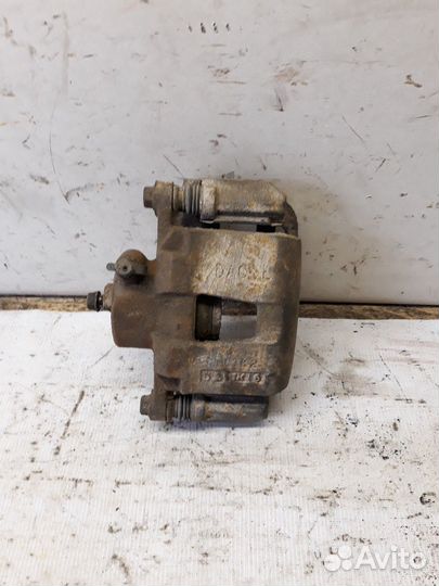 Суппорт передний левый Daewoo Nexia