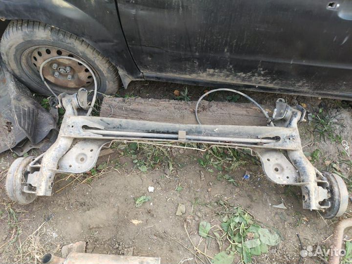 Задняя балка renault logan 1