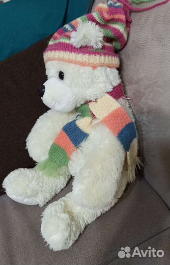 Aurora Медведь кремовый в шапке 50см