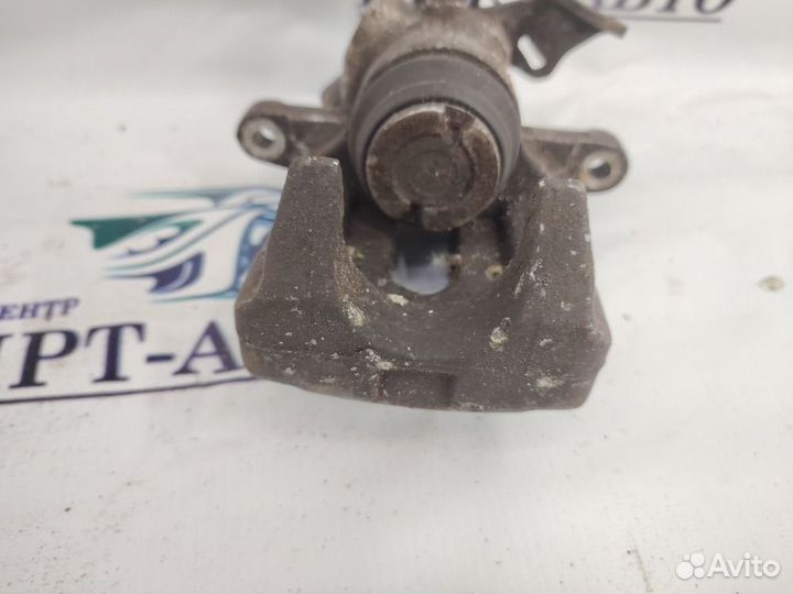 Суппорт тормозной задний правый Peugeot 308 I (2007—2011)