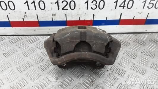 Суппорт тормозной передний левый nissan primera P1