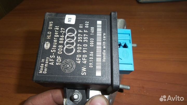 Регулировки угла наклона фар Audi Q7