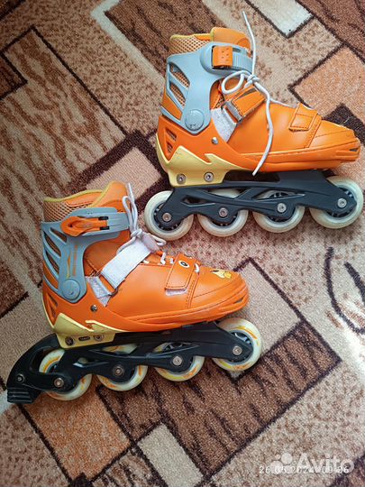 Роликовые коньки