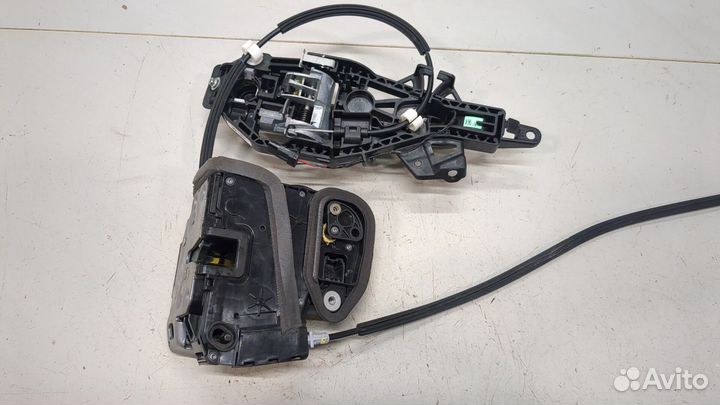 Замок двери левый задний Chevrolet Traverse