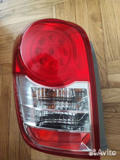 Задний фонарь левый toyota corolla fielder NZE 141